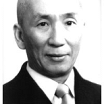 Ip Man in a suit fadded.jpg