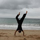 handstand on the beach