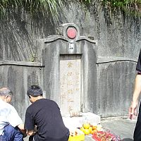 Sam Kwok and Ip Ching pay respects at Ip Man's grave in Fan Ling Hong Kong
